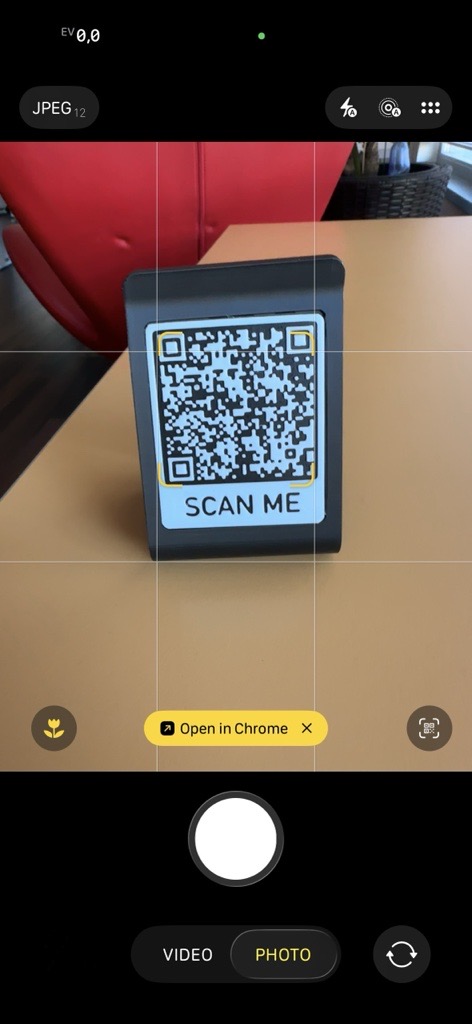 The customer's phone scans a QR code and opens the Nexus Retail catalog