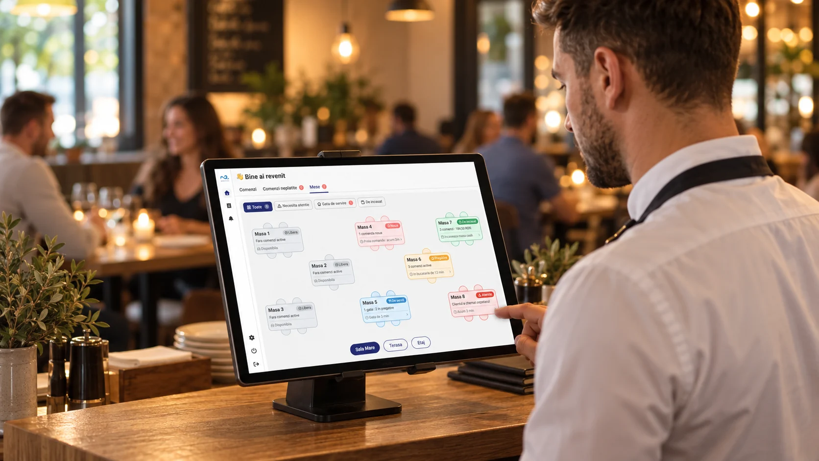 Waiter checking tables in the Nexus Retail Restaurant module